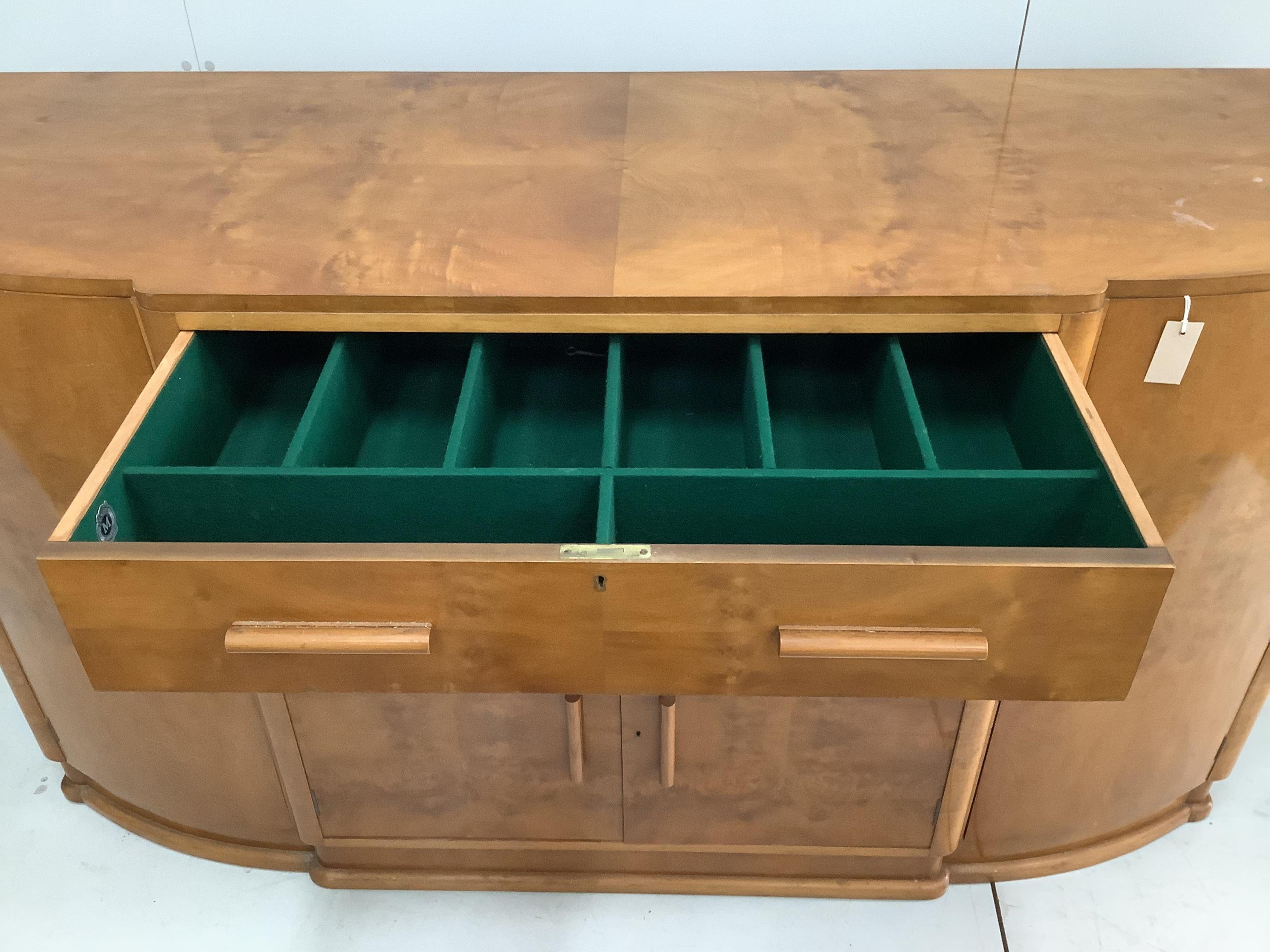 A Maples golden walnut sideboard, width 175cm, height 97cm. Condition - fair to good